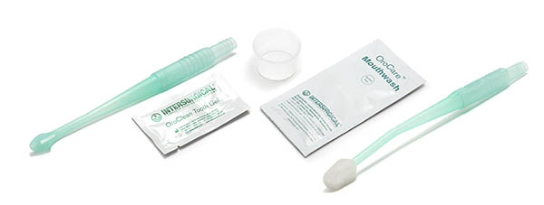Kit de cuidado oral OroCare com colutório de cloro-hexidina e gel dentário, escova com aspiração OroCare Aspire, vareta de aspiração OroCare Sensitive e copo dispensador
